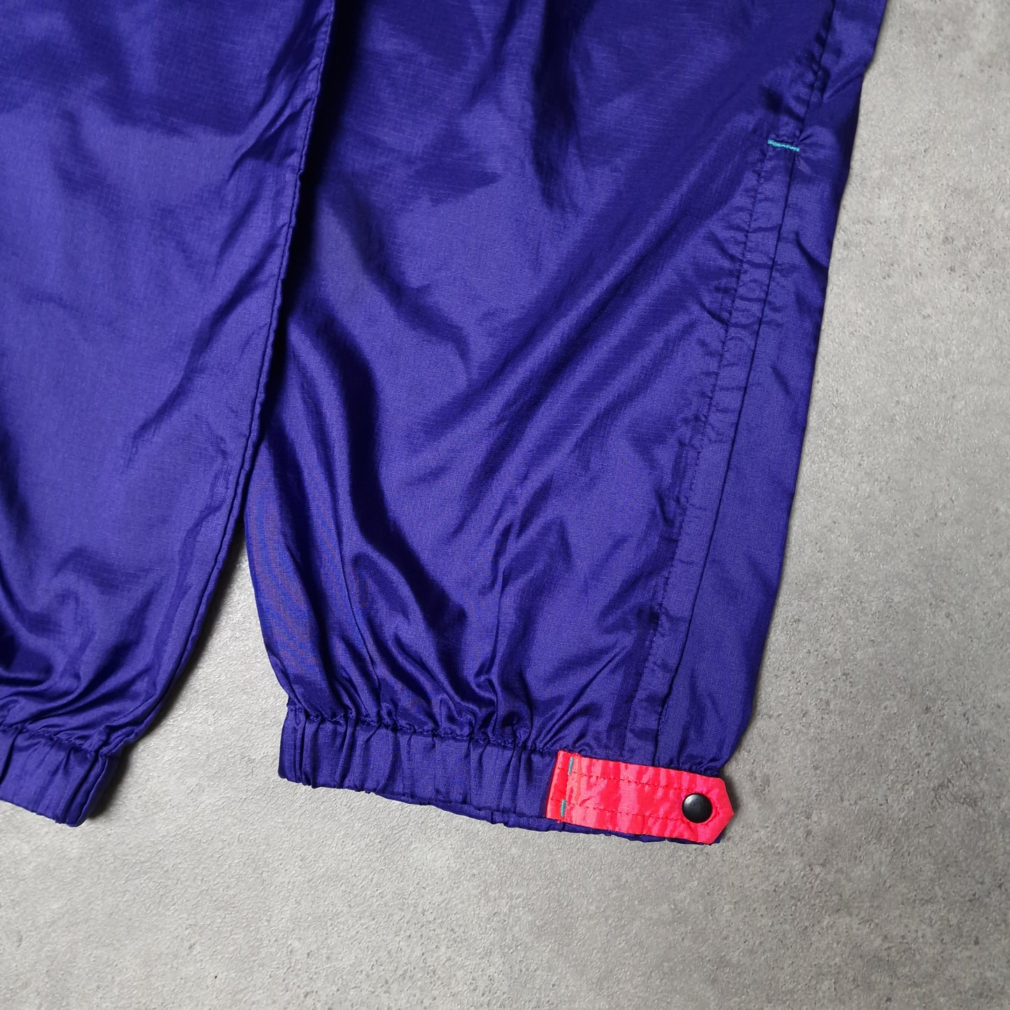 90s Columbia windbreaker trousers in purple - medium