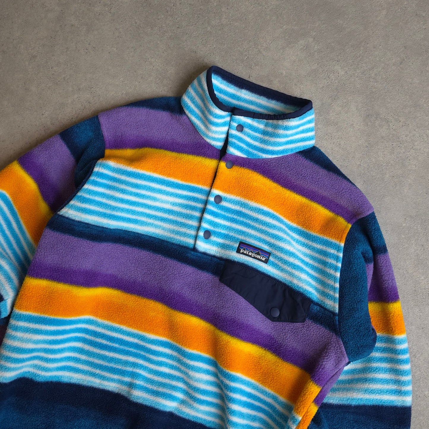 Patagonia patterned synchilla snap t fleece in blue, orange and purple - women's XS