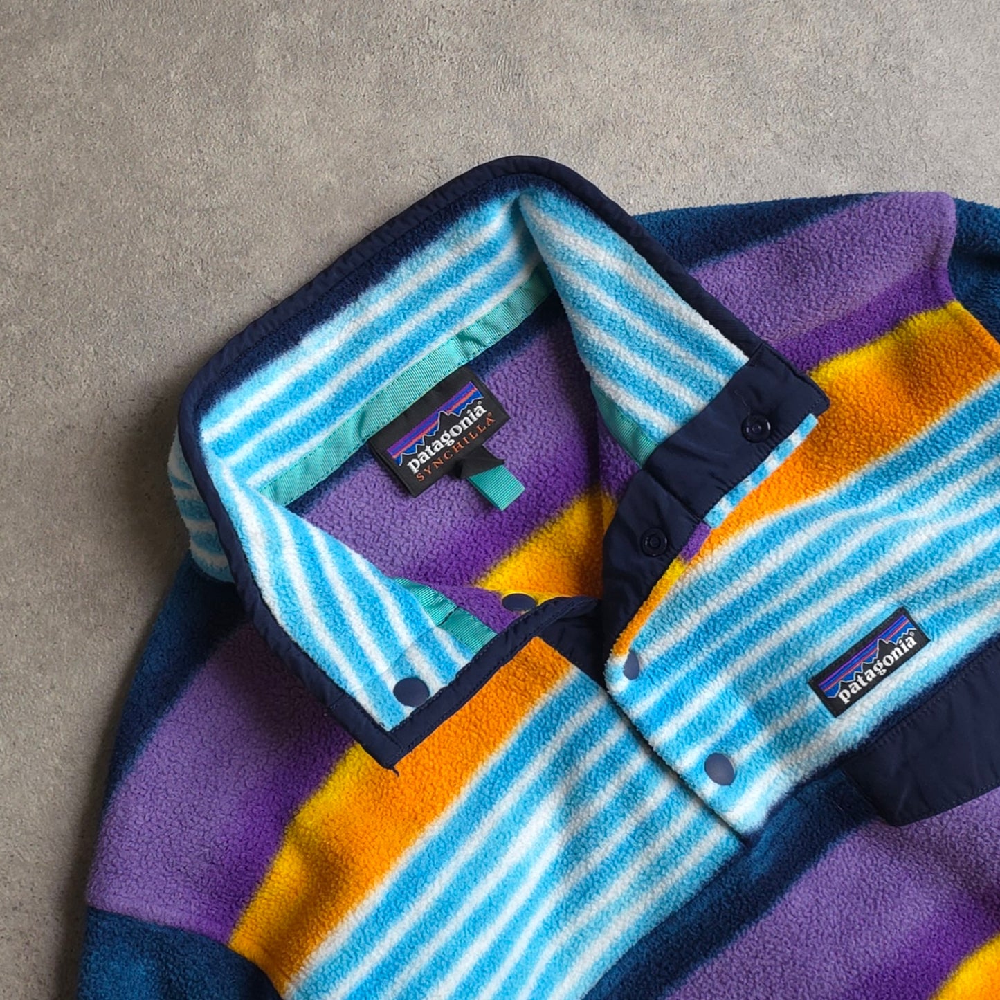 Patagonia patterned synchilla snap t fleece in blue, orange and purple - women's XS