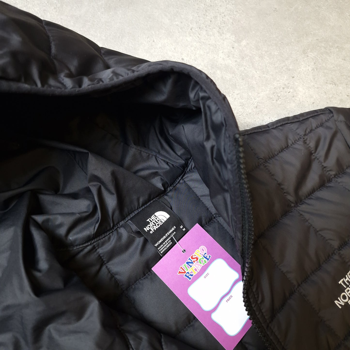 The North Face padded jacket in black - women's medium