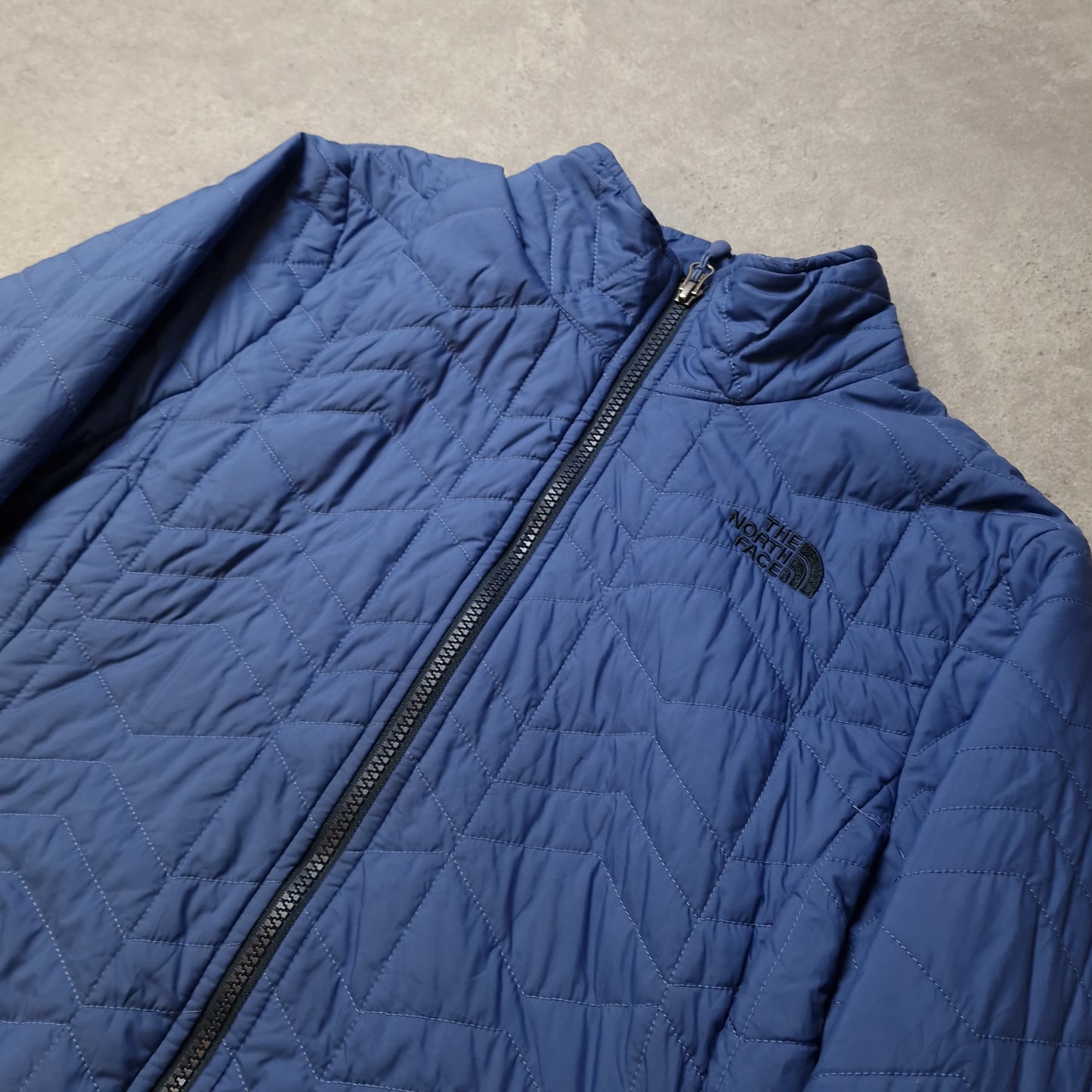 The North Face padded jacket in blue - women's large