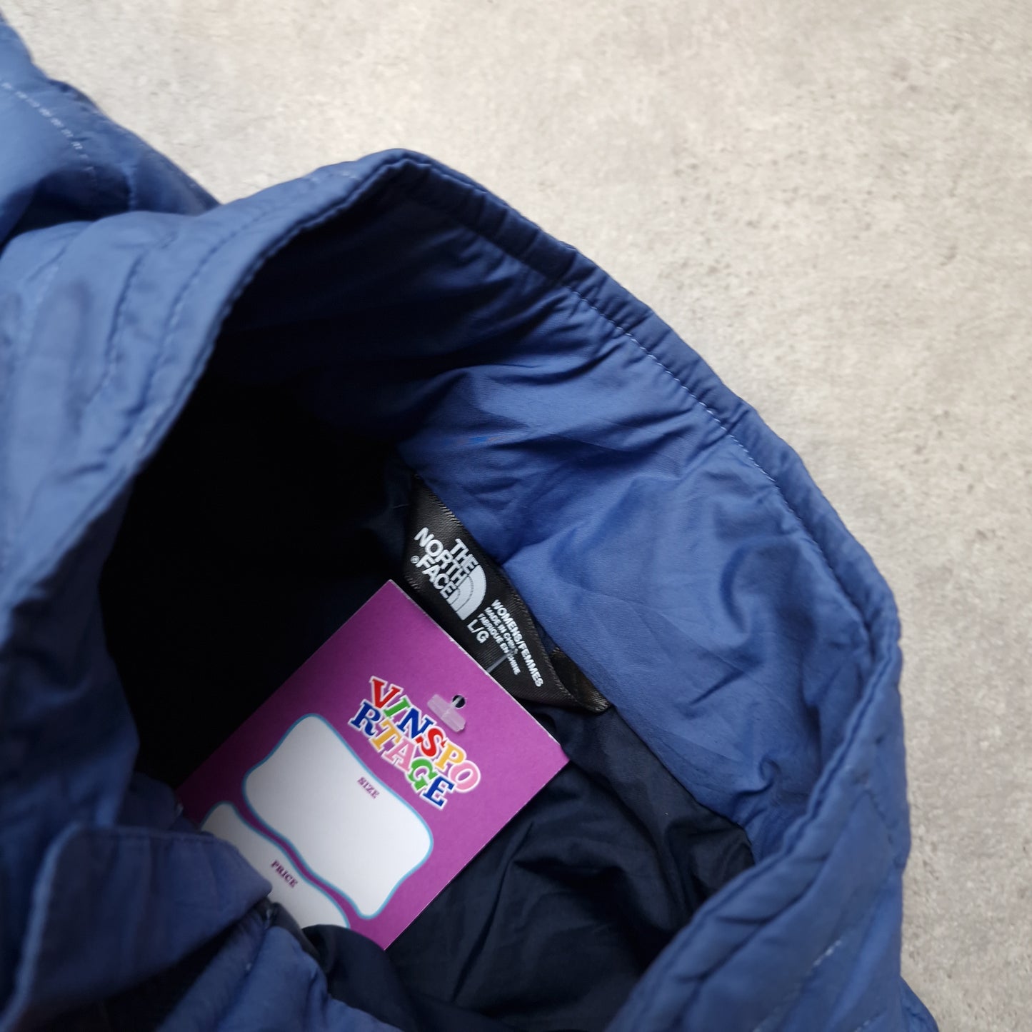 The North Face padded jacket in blue - women's large