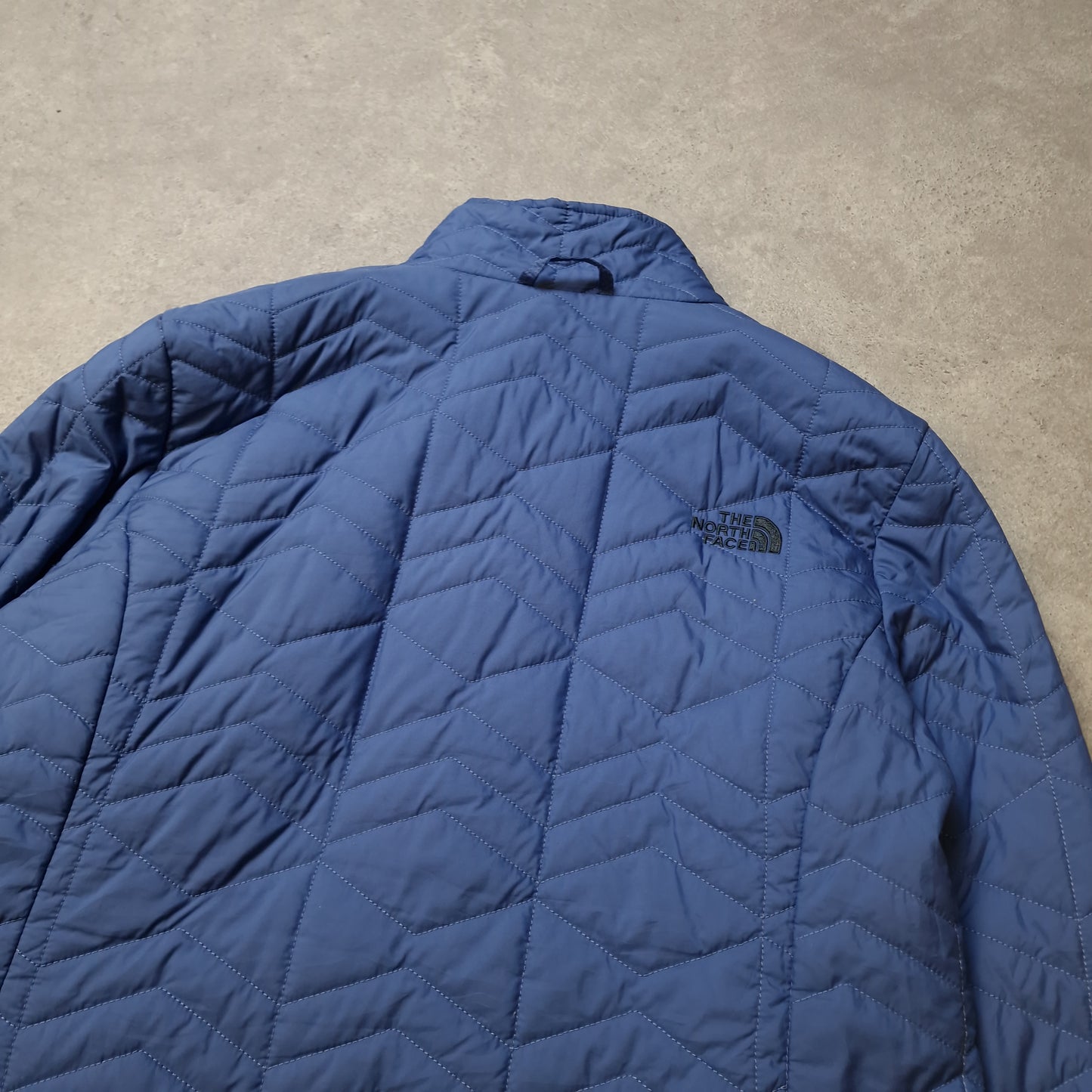 The North Face padded jacket in blue - women's large