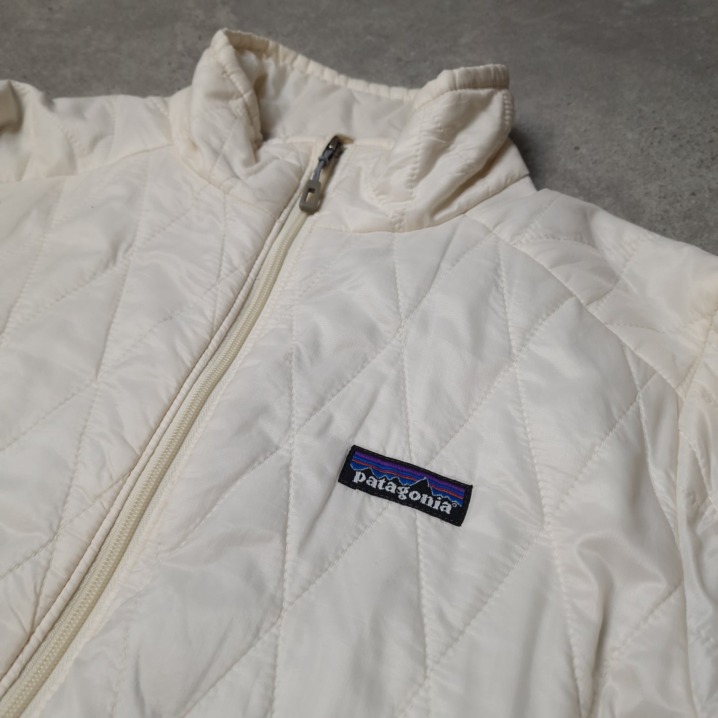 Patagonia nano puff down jacket in white - women's medium