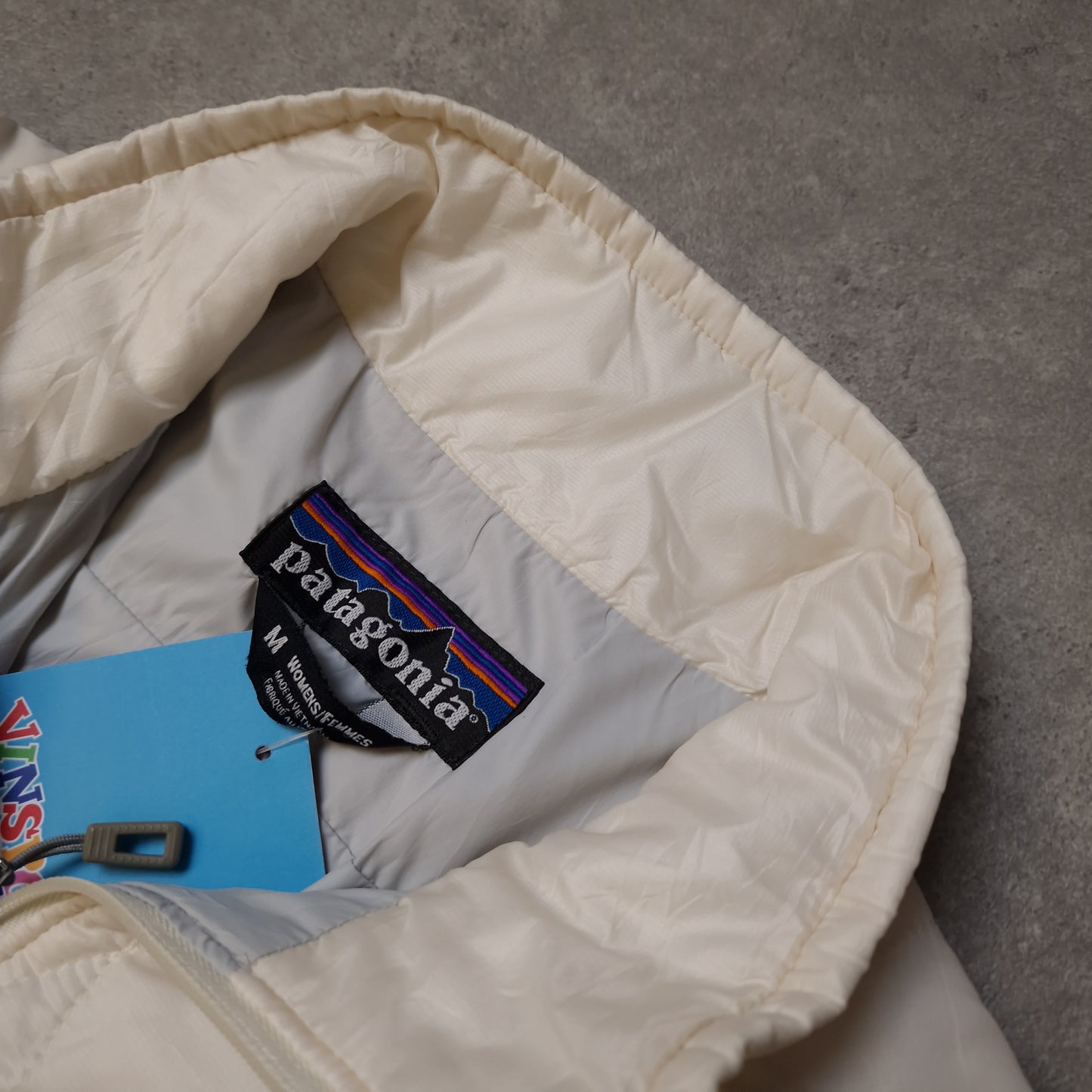Patagonia nano puff down jacket in white - women's medium