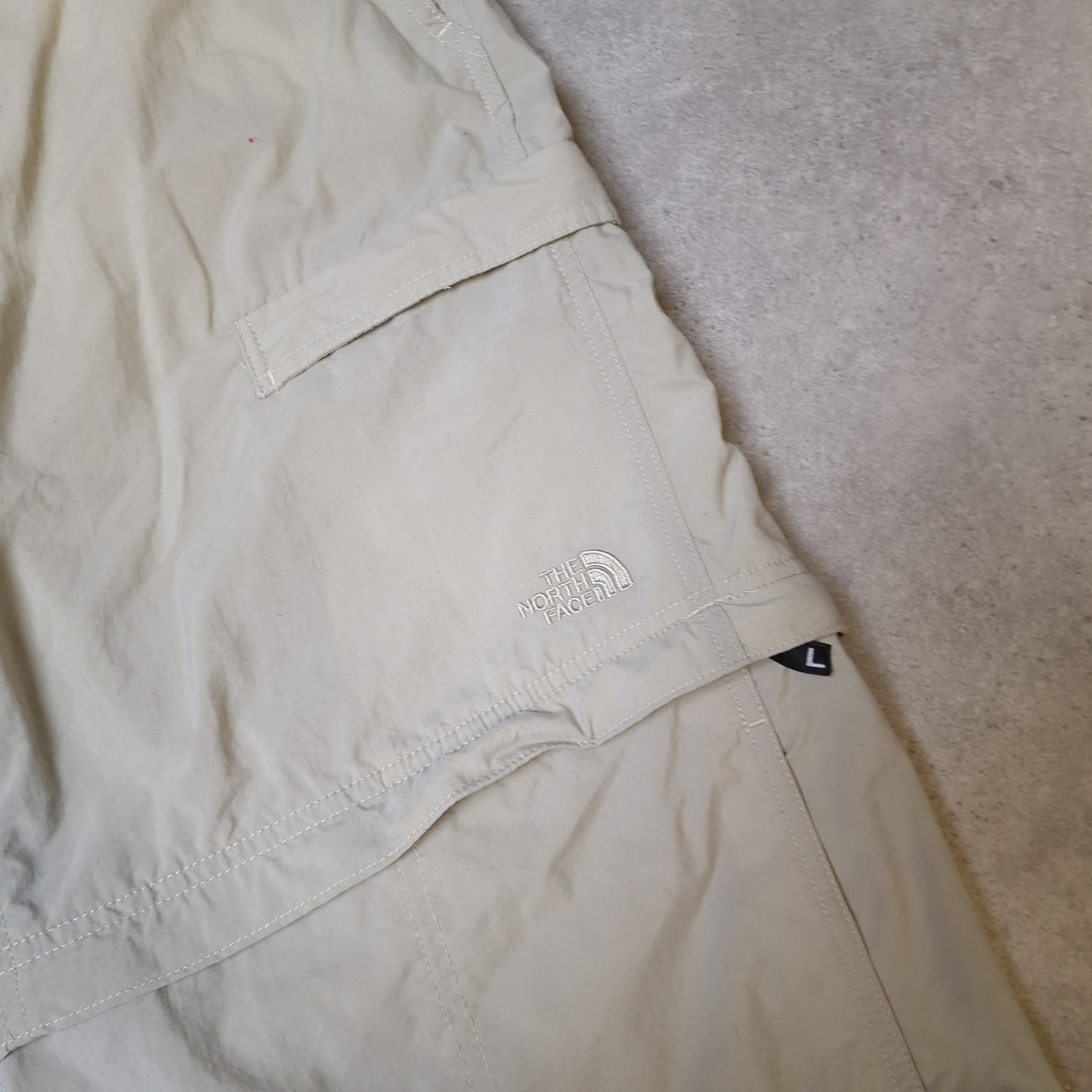 The North Face convertible trousers in cream -  large