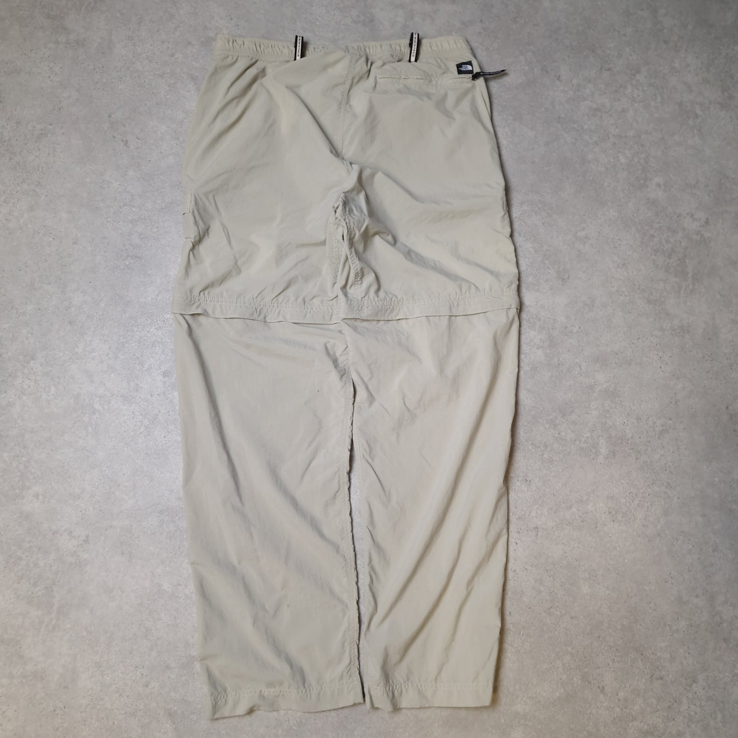 The North Face convertible trousers in cream -  large