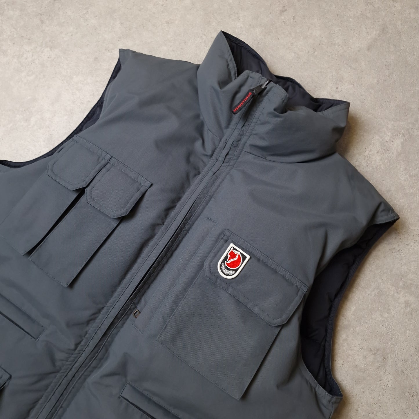 Fjallraven reversible puffer gilet in black and grey - medium