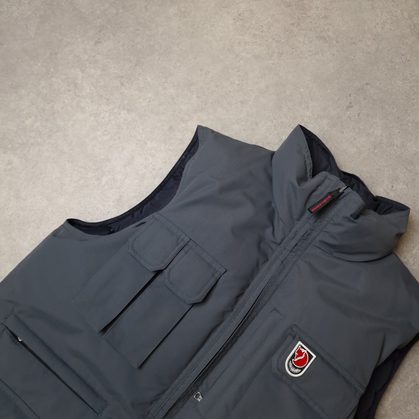 Fjallraven reversible puffer gilet in black and grey - medium