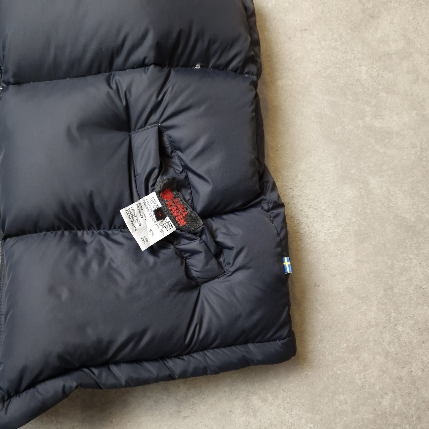 Fjallraven reversible puffer gilet in black and grey - medium