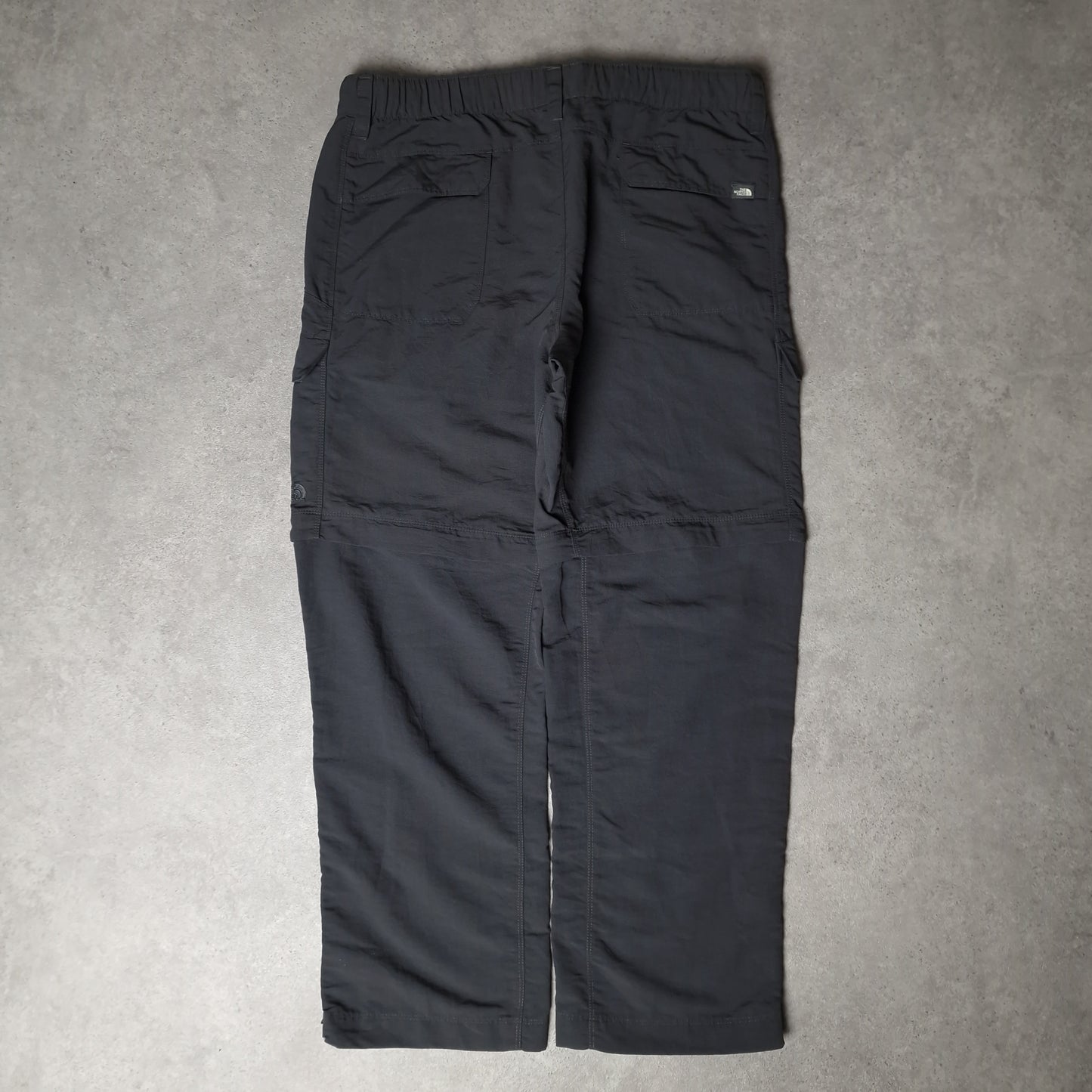 The North Face convertible baggy trousers in grey - Large
