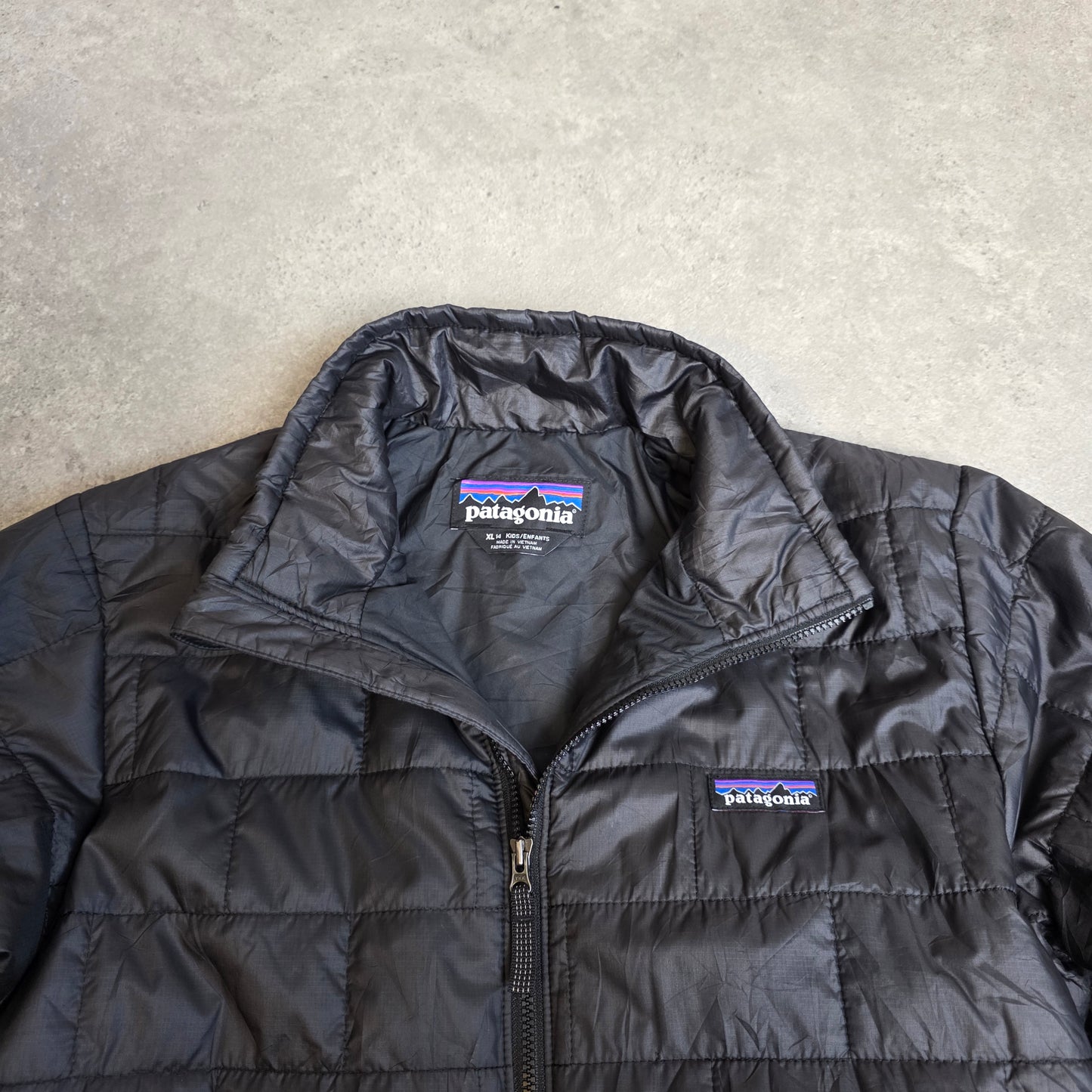 Patagonia nano puff jacket in black - junior XL