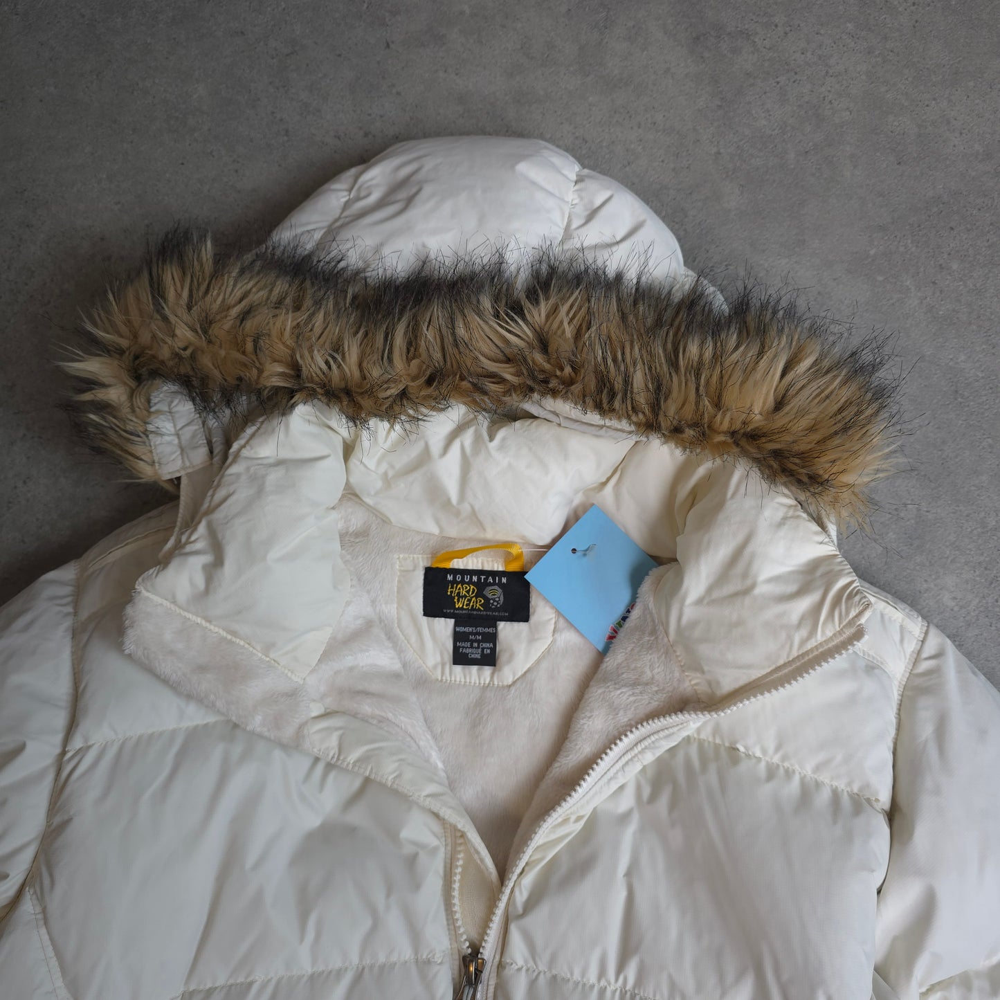 Mountain Hardwear down filled long jacket in white - women's medium