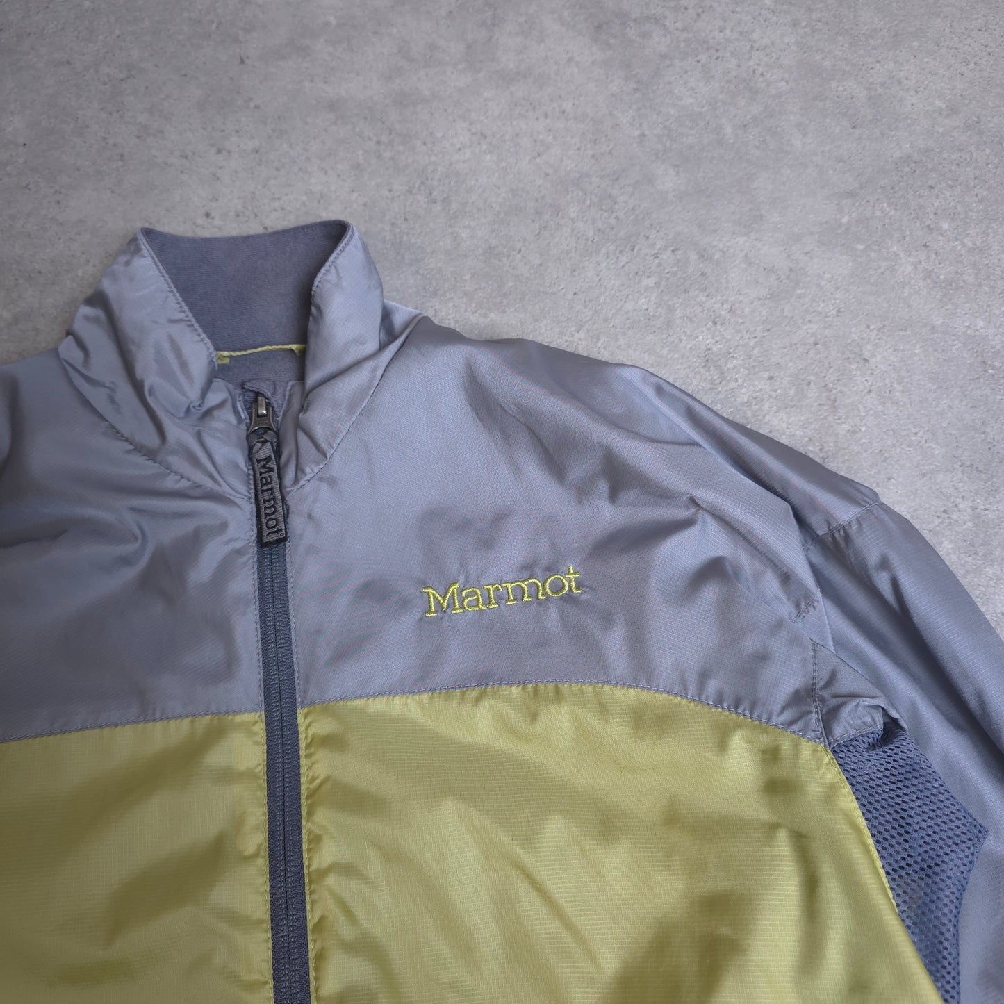 Marmot fleece lined windbreaker in green and grey - women's small