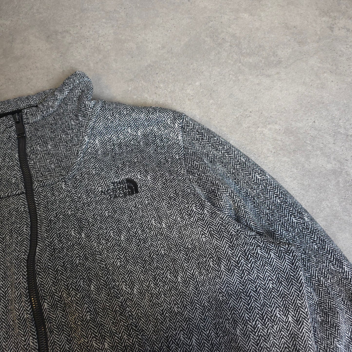 the north face zip up fleece in black and white - women's XL