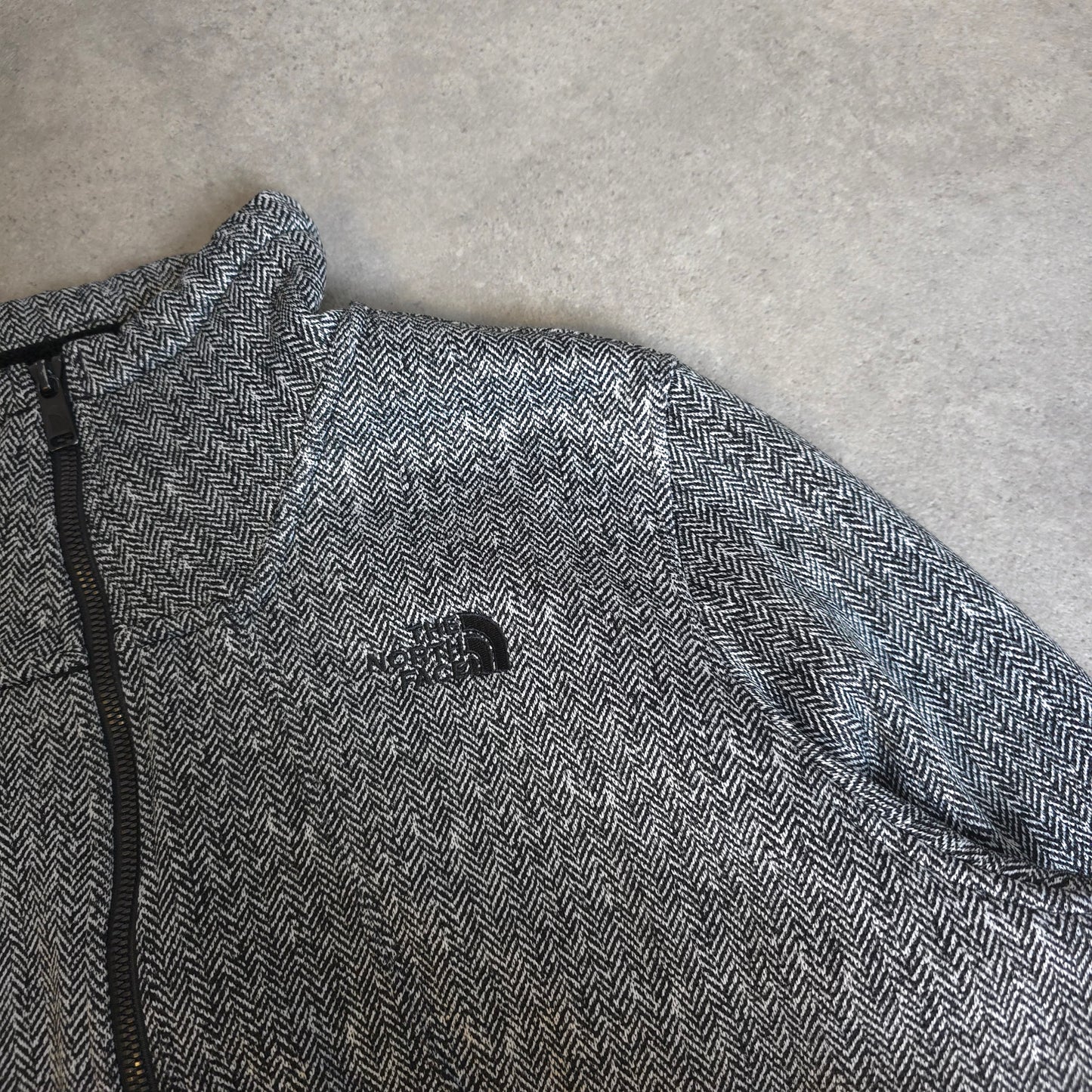 the north face zip up fleece in black and white - women's XL