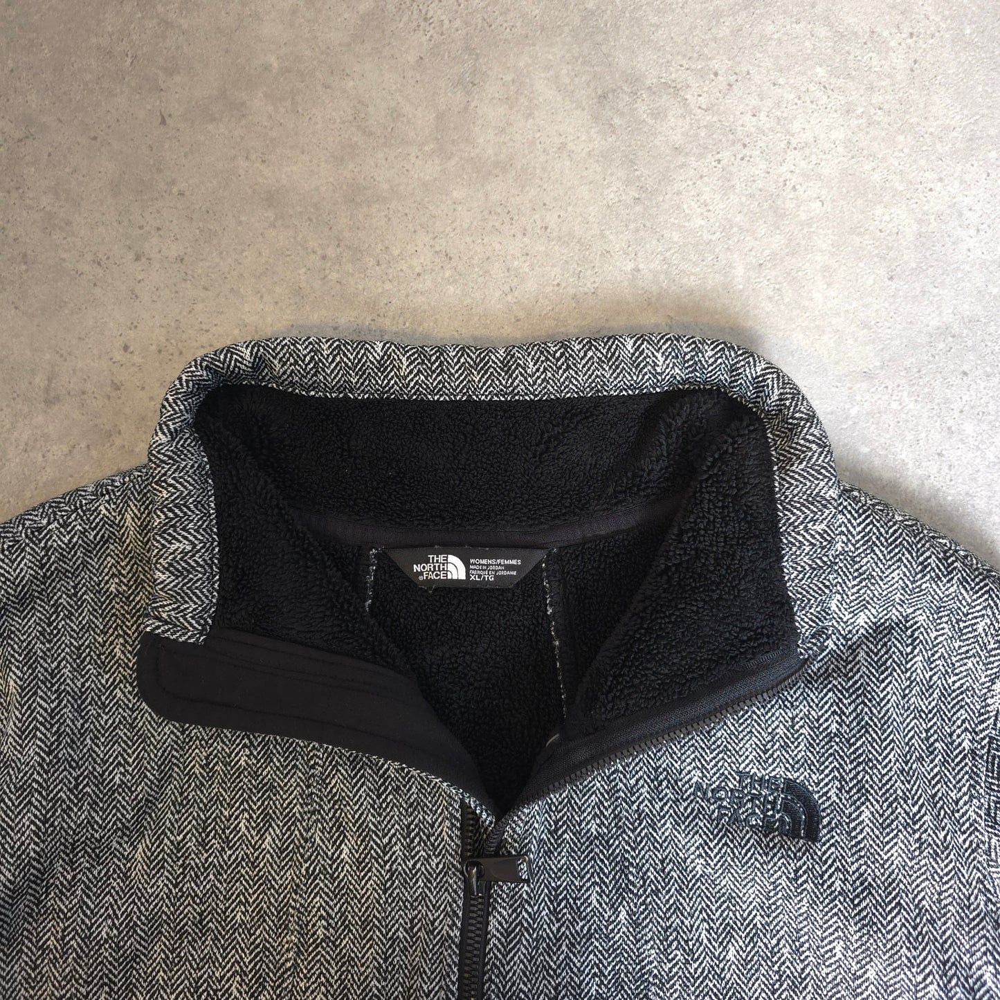 the north face zip up fleece in black and white - women's XL