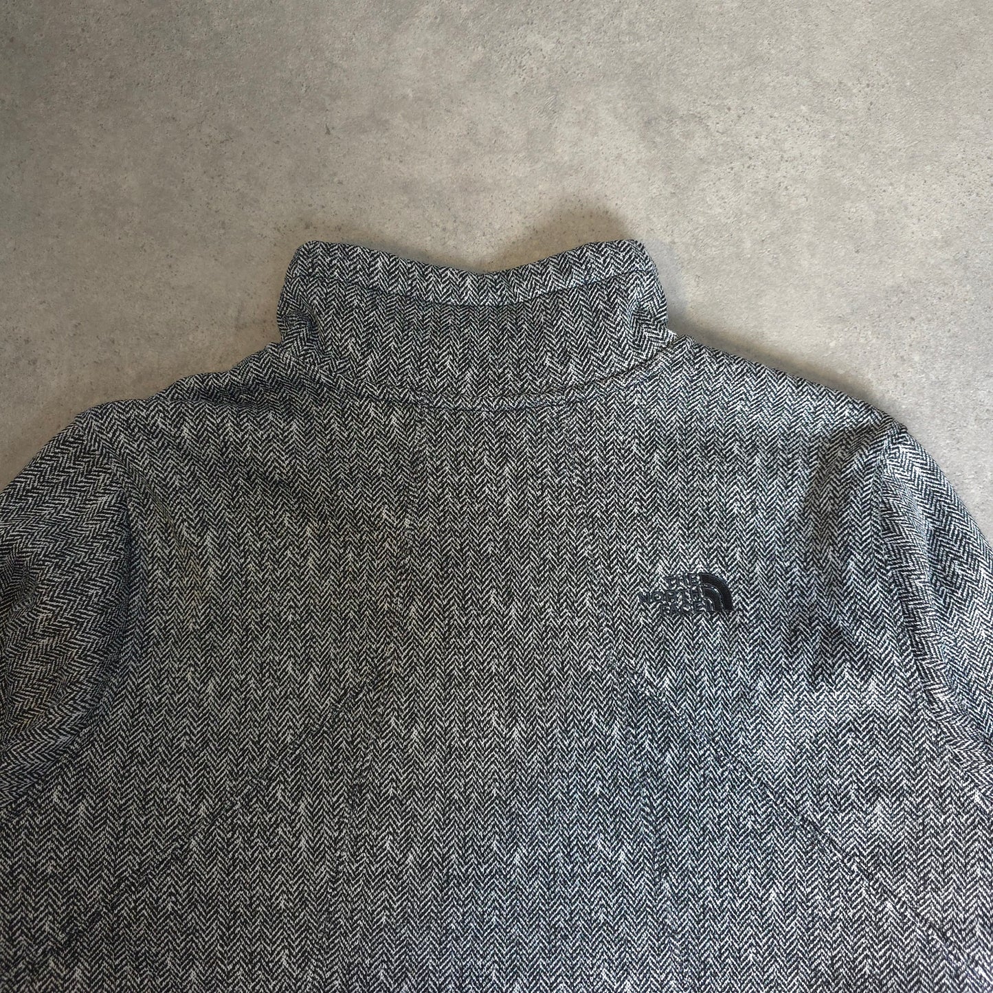 the north face zip up fleece in black and white - women's XL