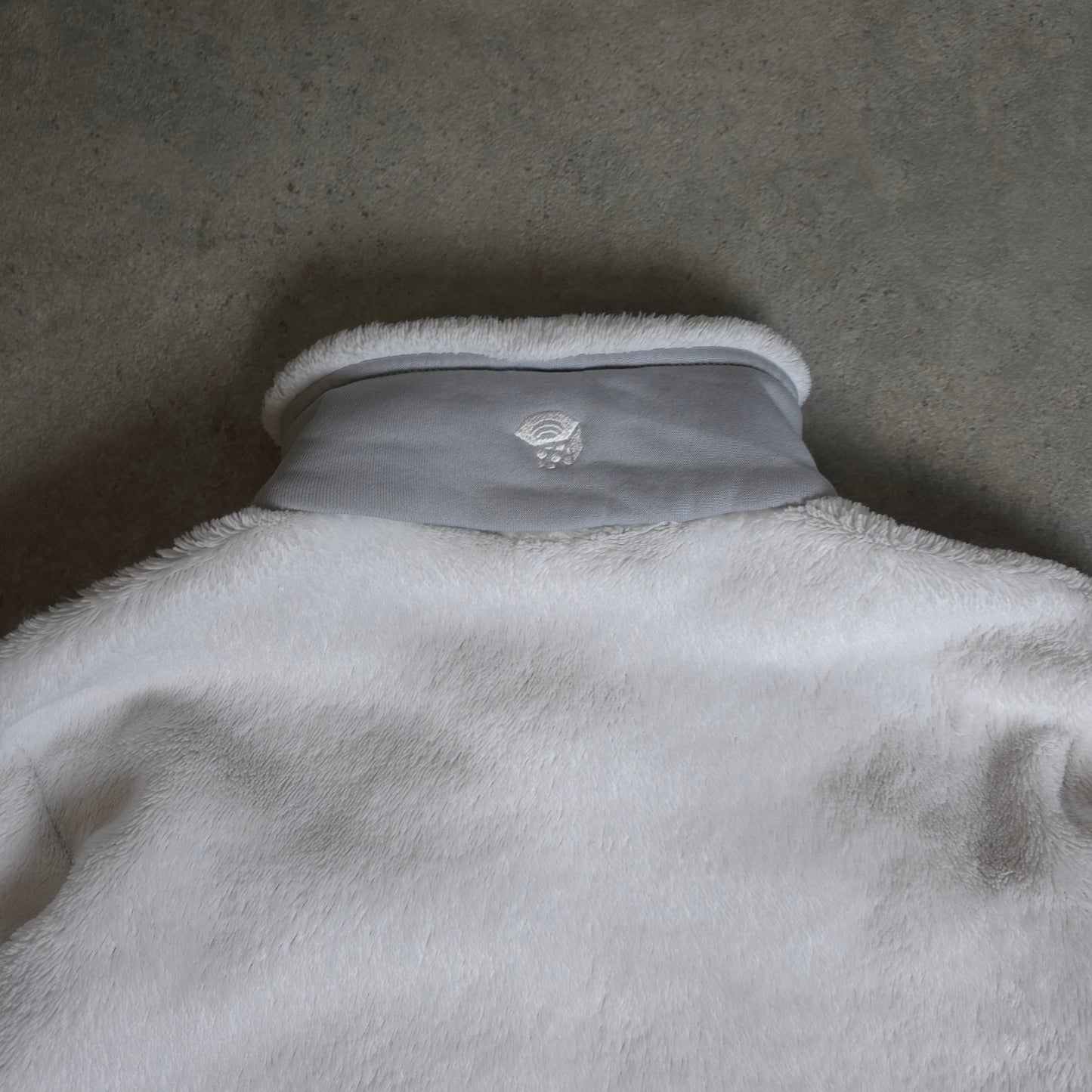 Mountain Hardwear fluffy fleece in white and grey - women's small