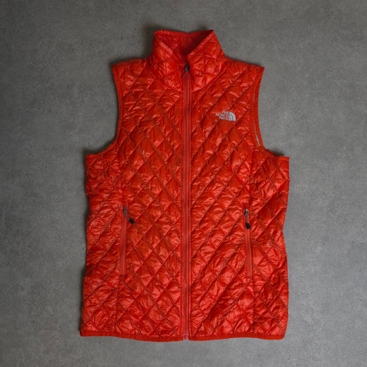 vintage the north face thermoball gilet in orange - women's small