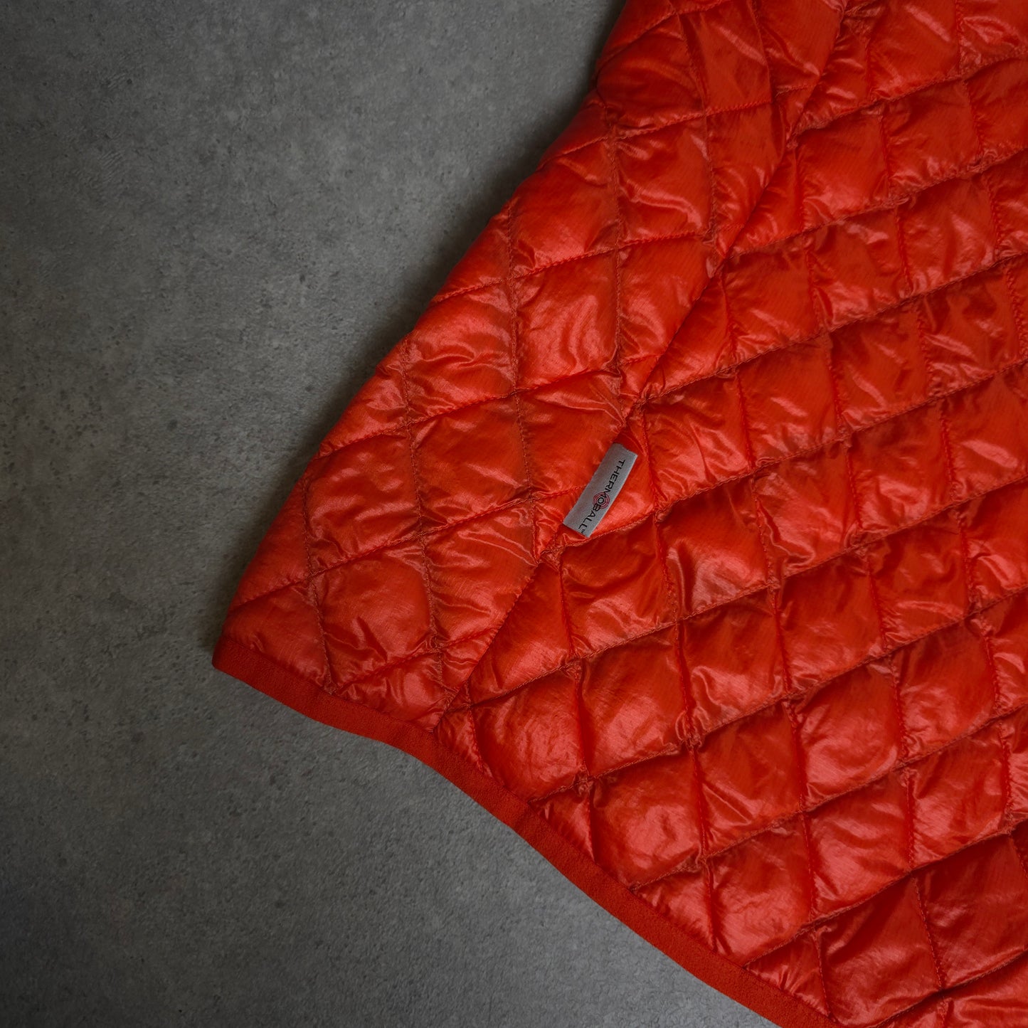 vintage the north face thermoball gilet in orange - women's small