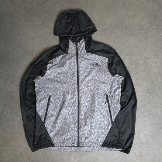 The north face windbreaker jacket in grey - medium