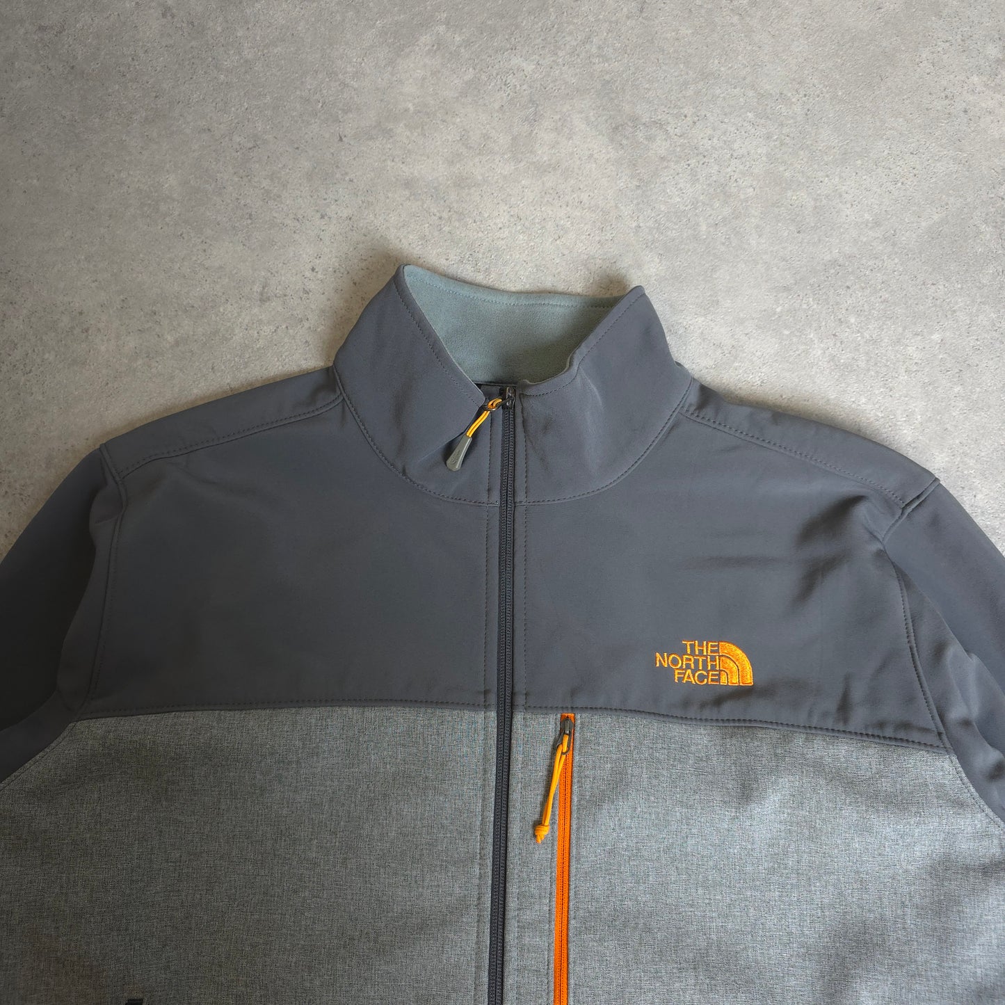 The north face soft shell jacket in grey and orange - XL