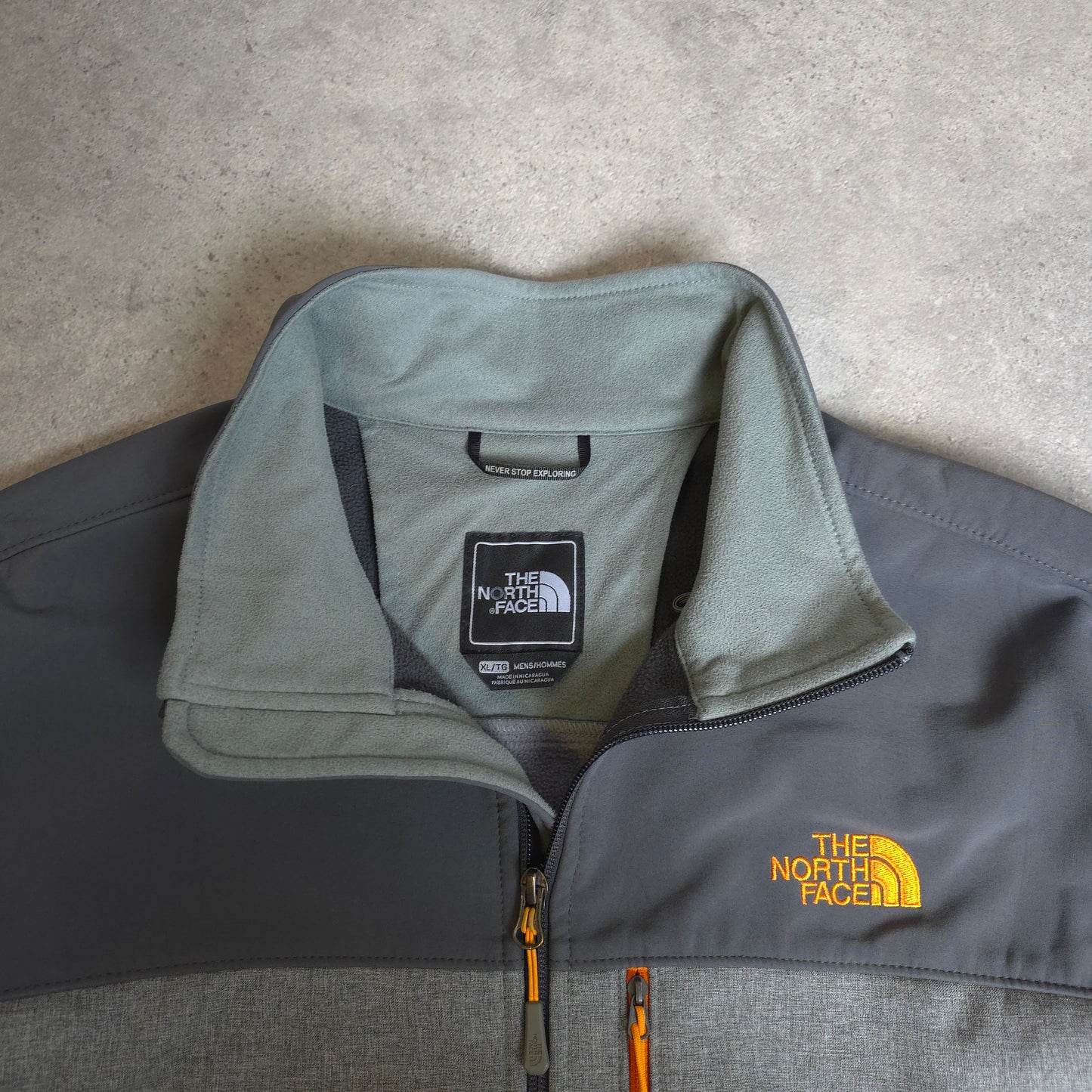 The north face soft shell jacket in grey and orange - XL