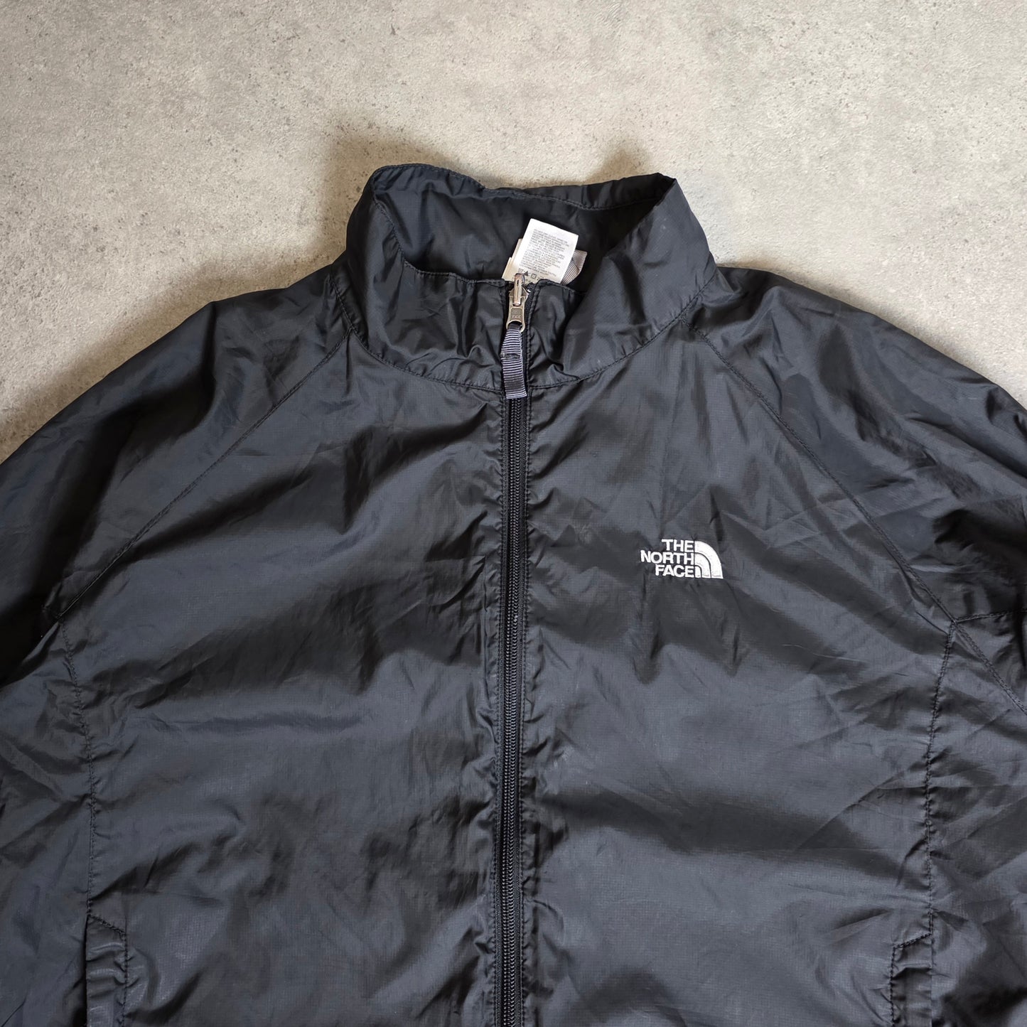 The north face windbreaker jacket in black - XL