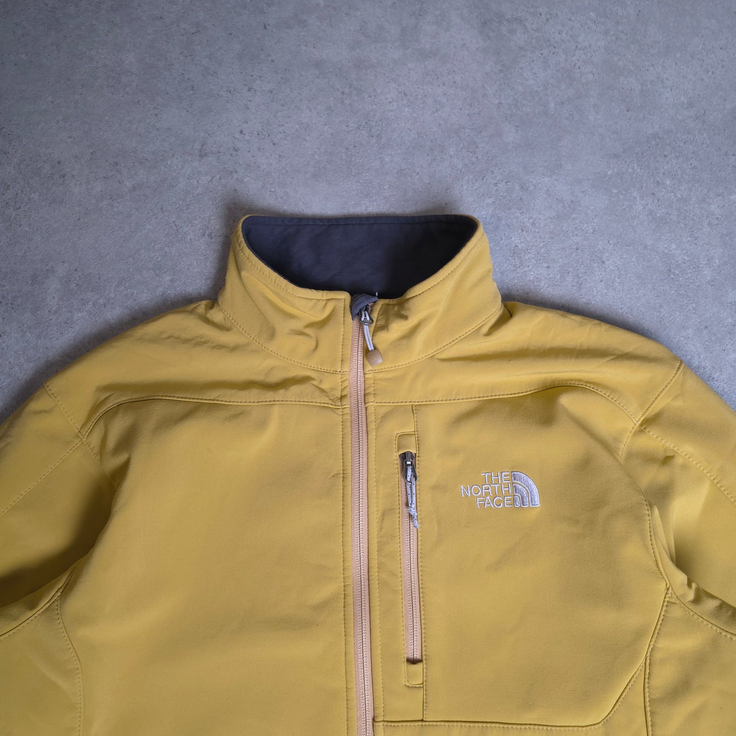 The north face soft shell jacket in mustard yellow - medium
