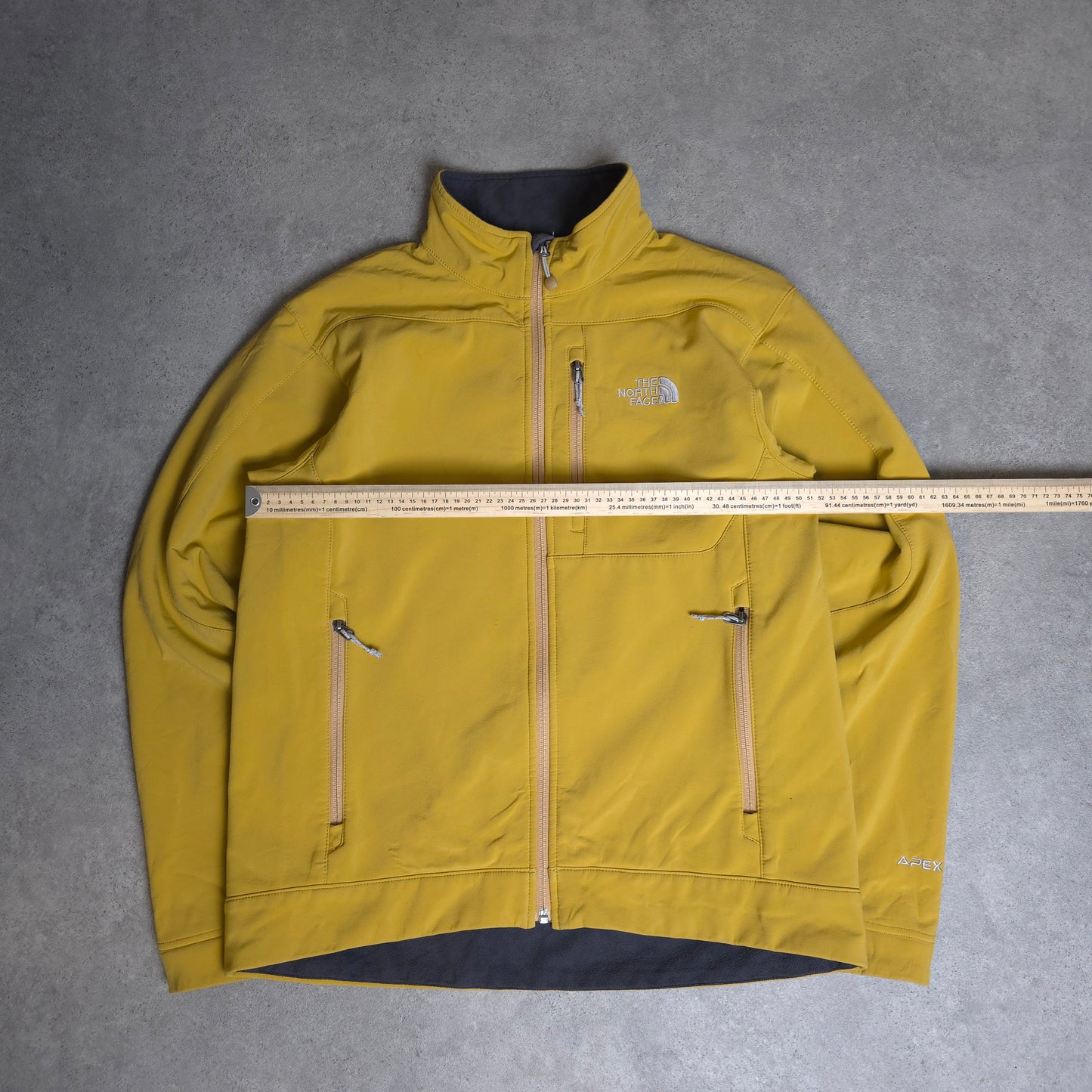 The north face soft shell jacket in mustard yellow - medium