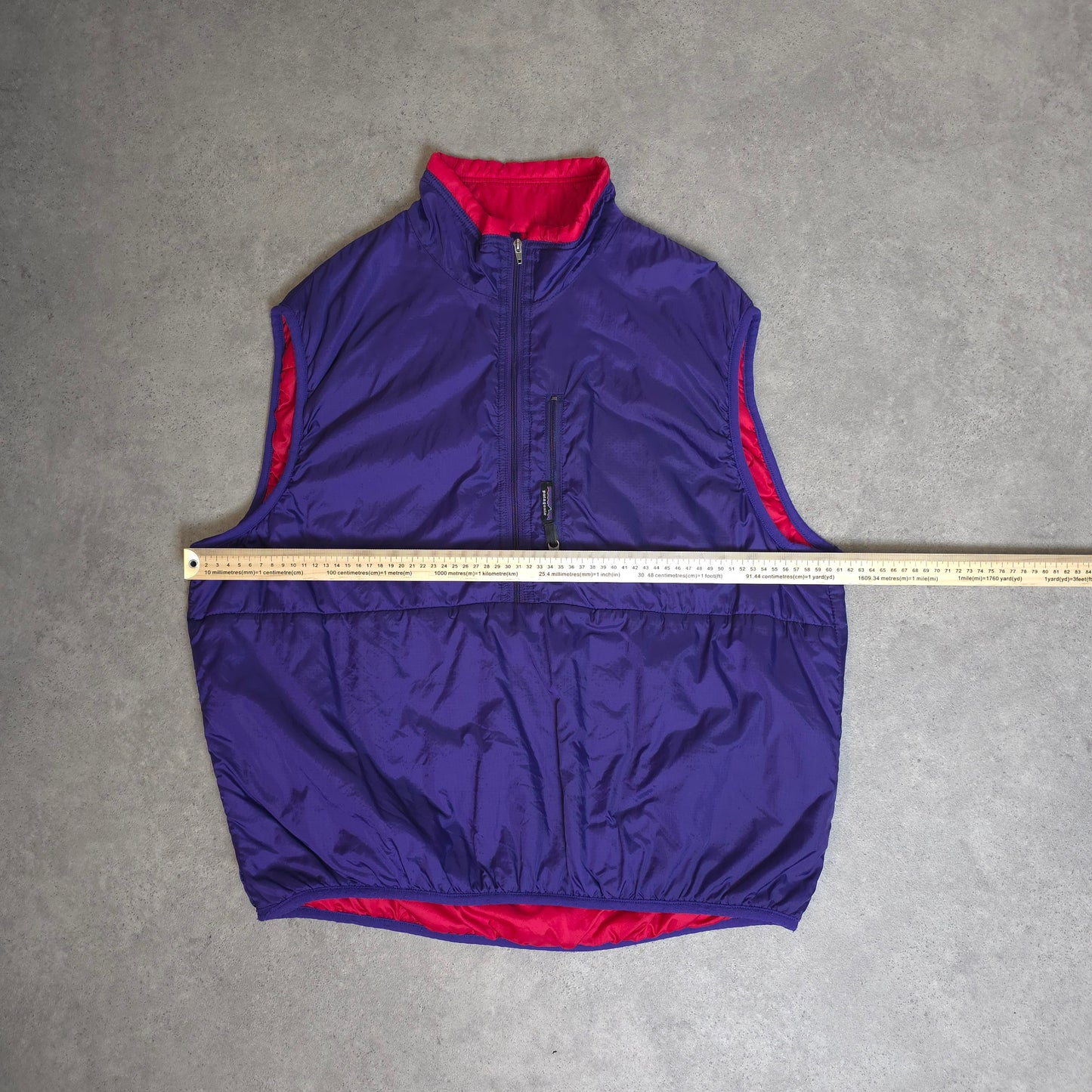 Rare vintage patagonia puffball vest in purple and red - large