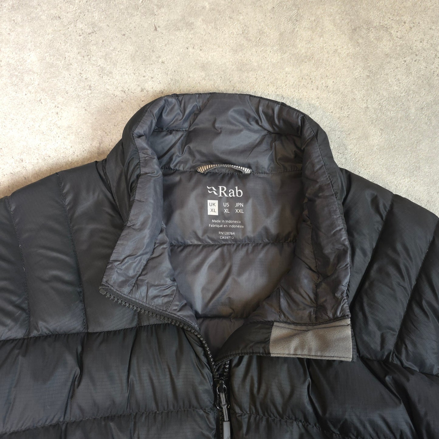 Rab electron pro down jacket in black - XL