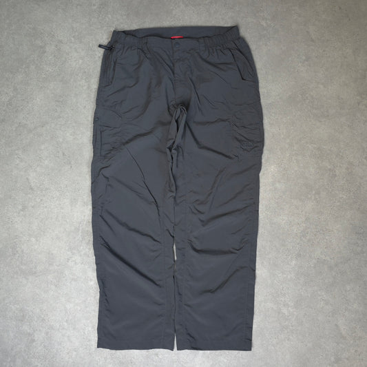 The North Face baggy walking trousers with stow pocket in grey - XL