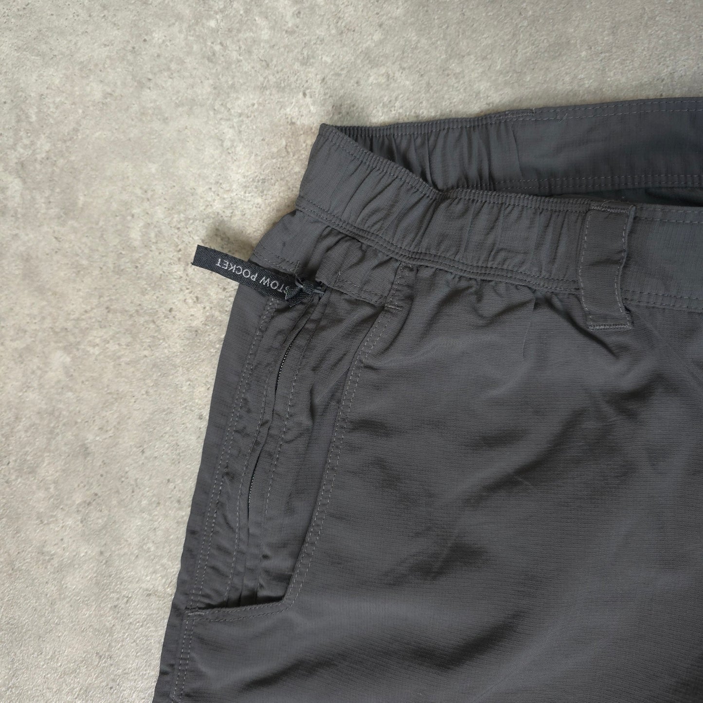 The North Face baggy walking trousers with stow pocket in grey - XL