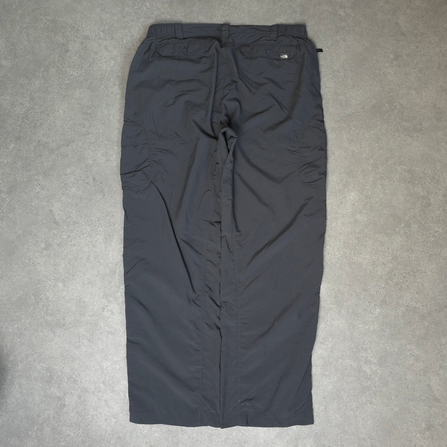 The North Face baggy walking trousers with stow pocket in grey - XL
