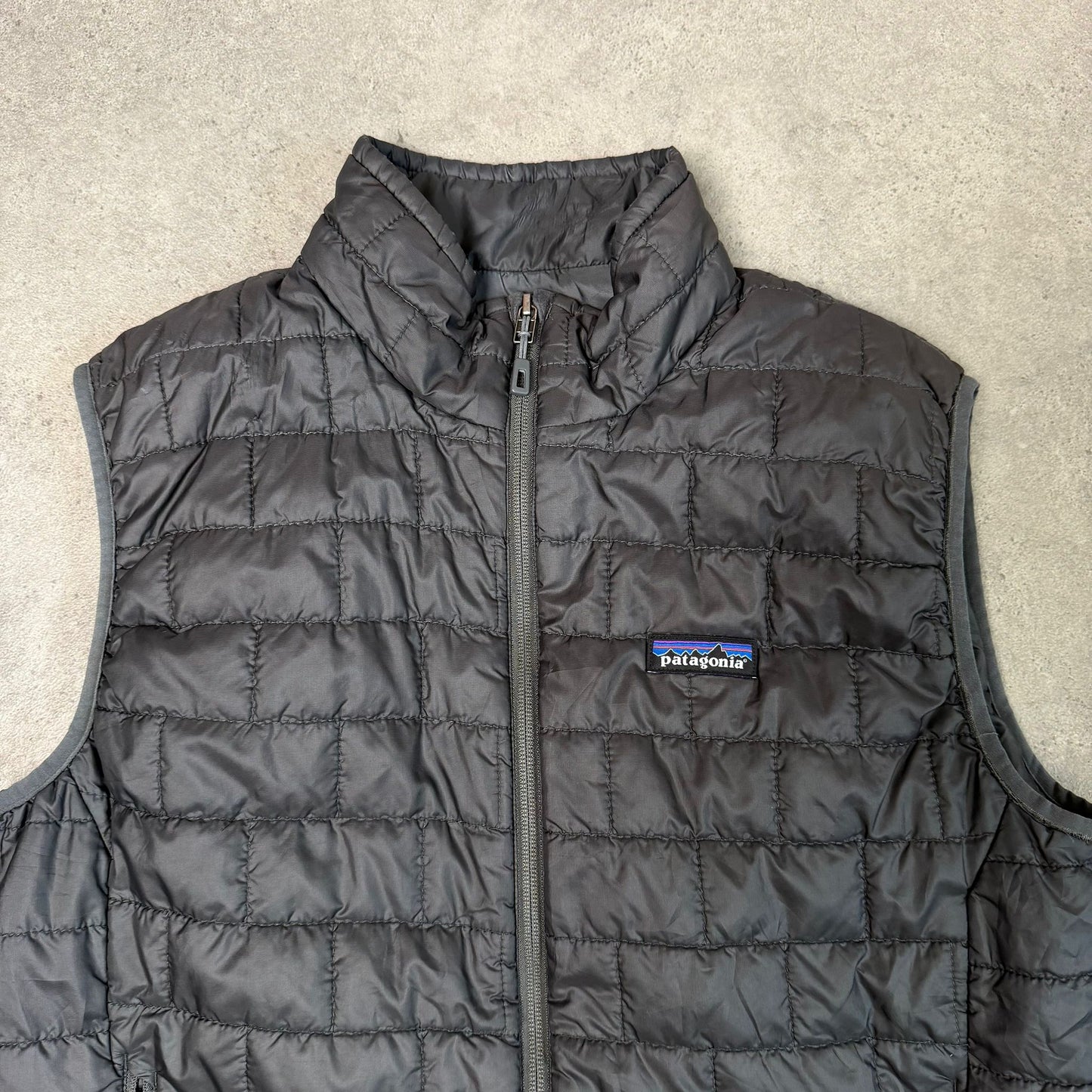Patagonia nano puff gilet vest body warmer in dark grey - medium