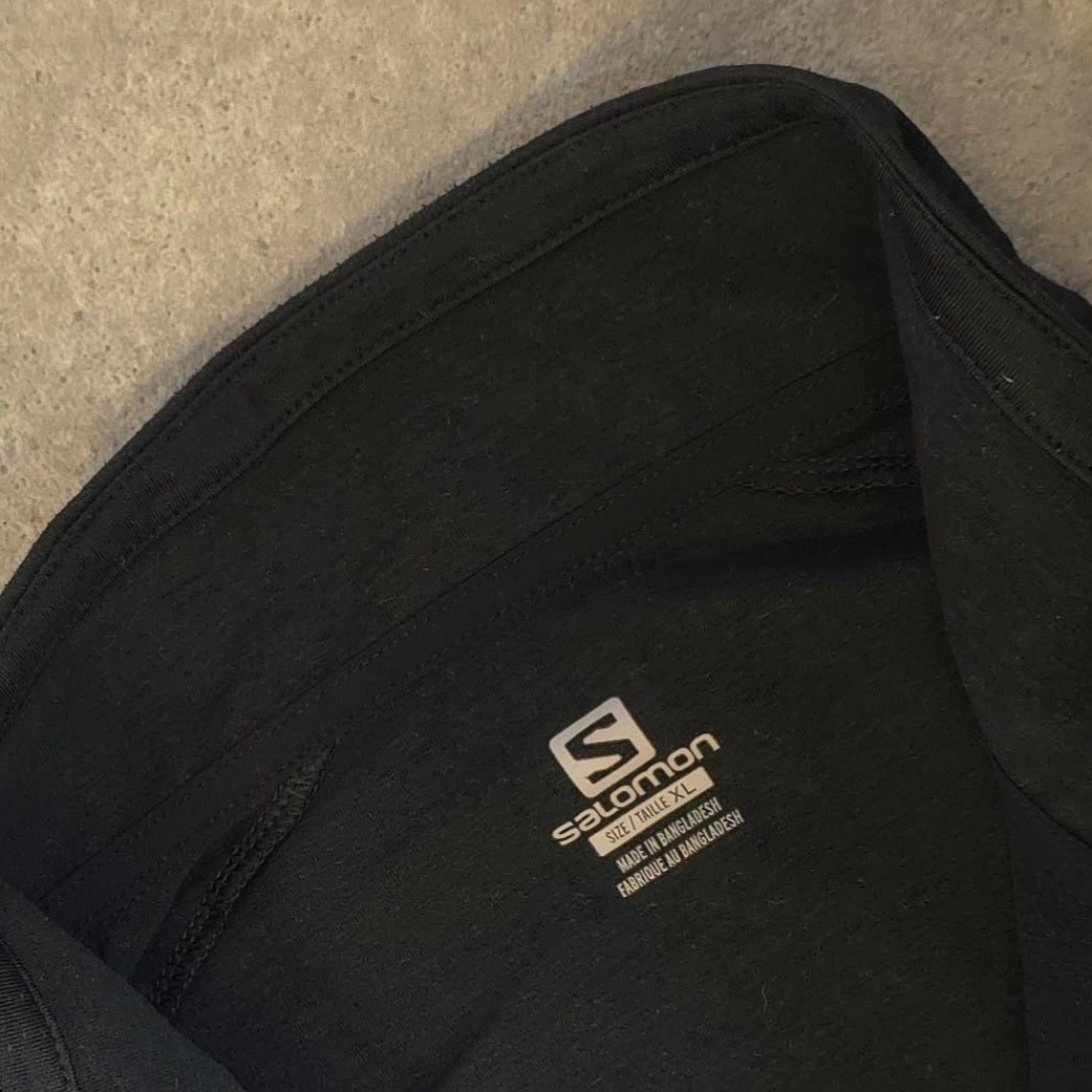 Salomon discovery stretch 1/4 zip midlayer in black - XL