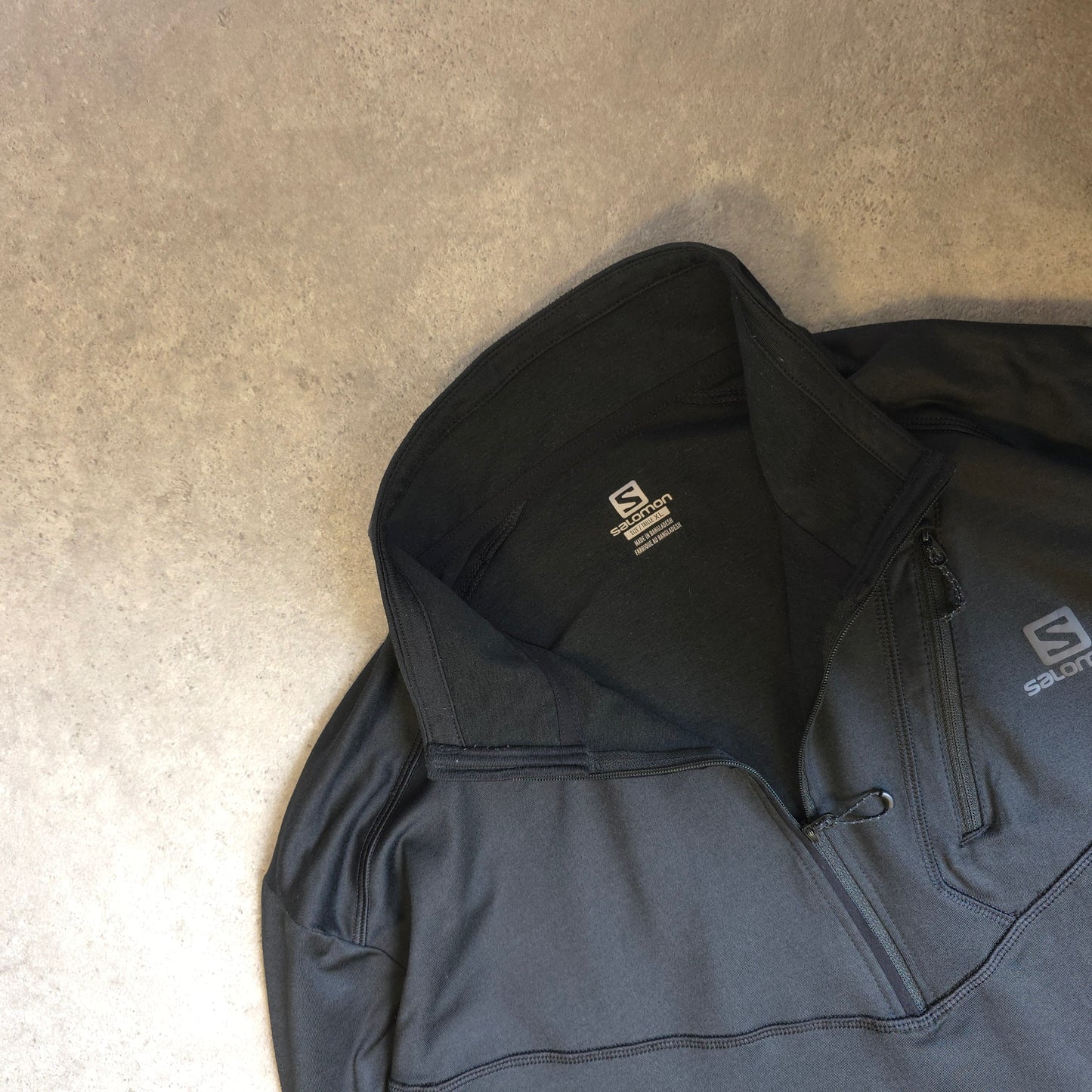 Salomon discovery stretch 1/4 zip midlayer in black - XL
