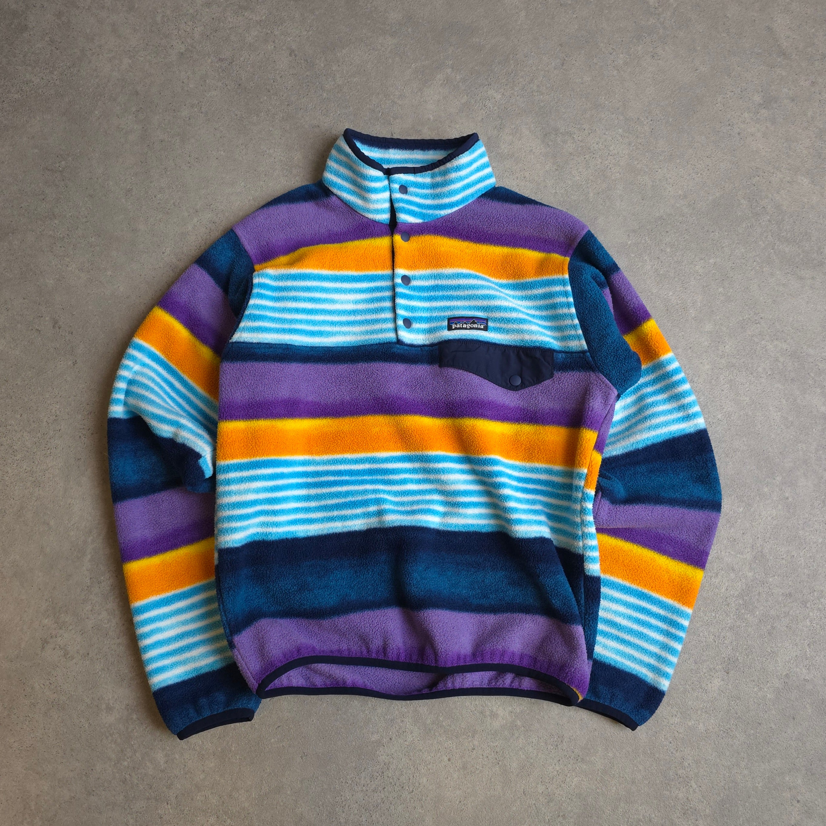 Patagonia patterned synchilla snap t fleece in blue, orange and