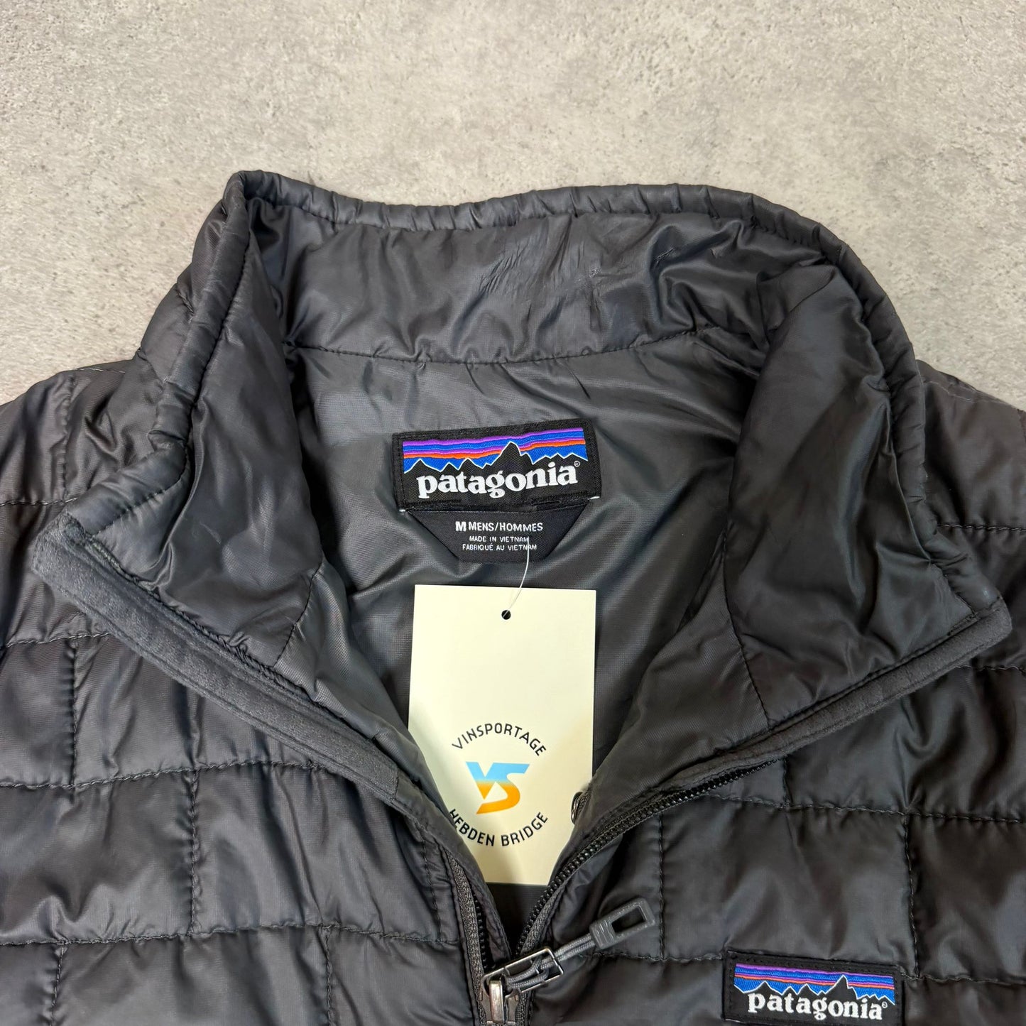 Patagonia nano puff gilet vest body warmer in dark grey - medium